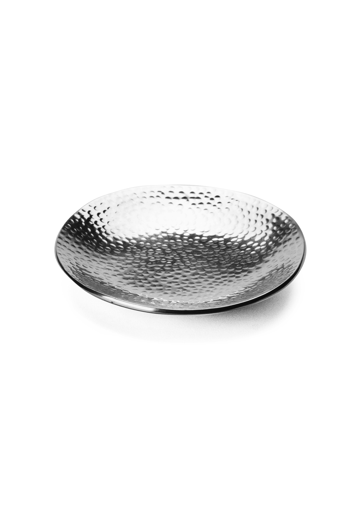 Hammered metal bowl on a white background
