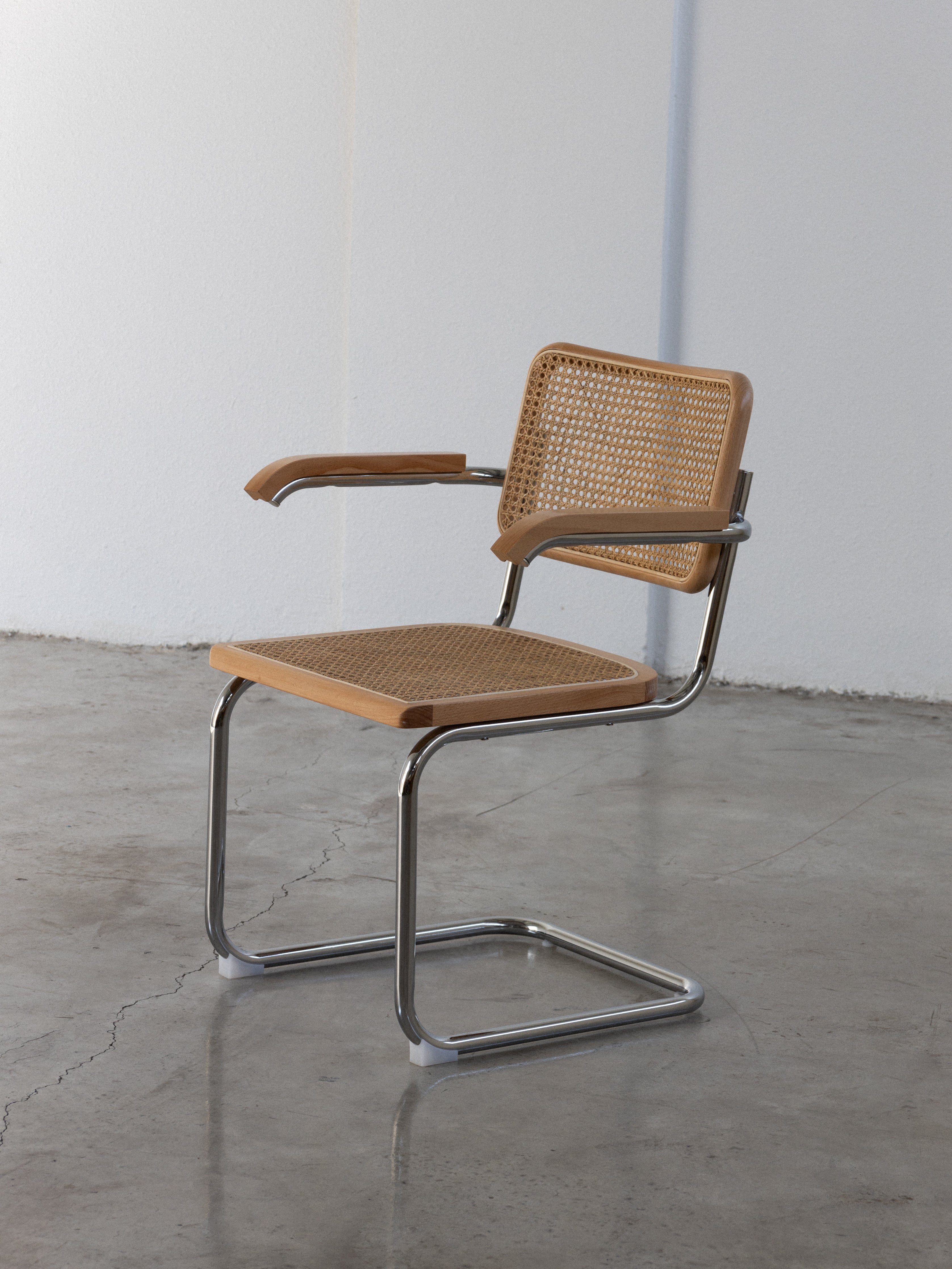 The Cantilever S 64 Rattan Modern Designer Chair UAE | Forma