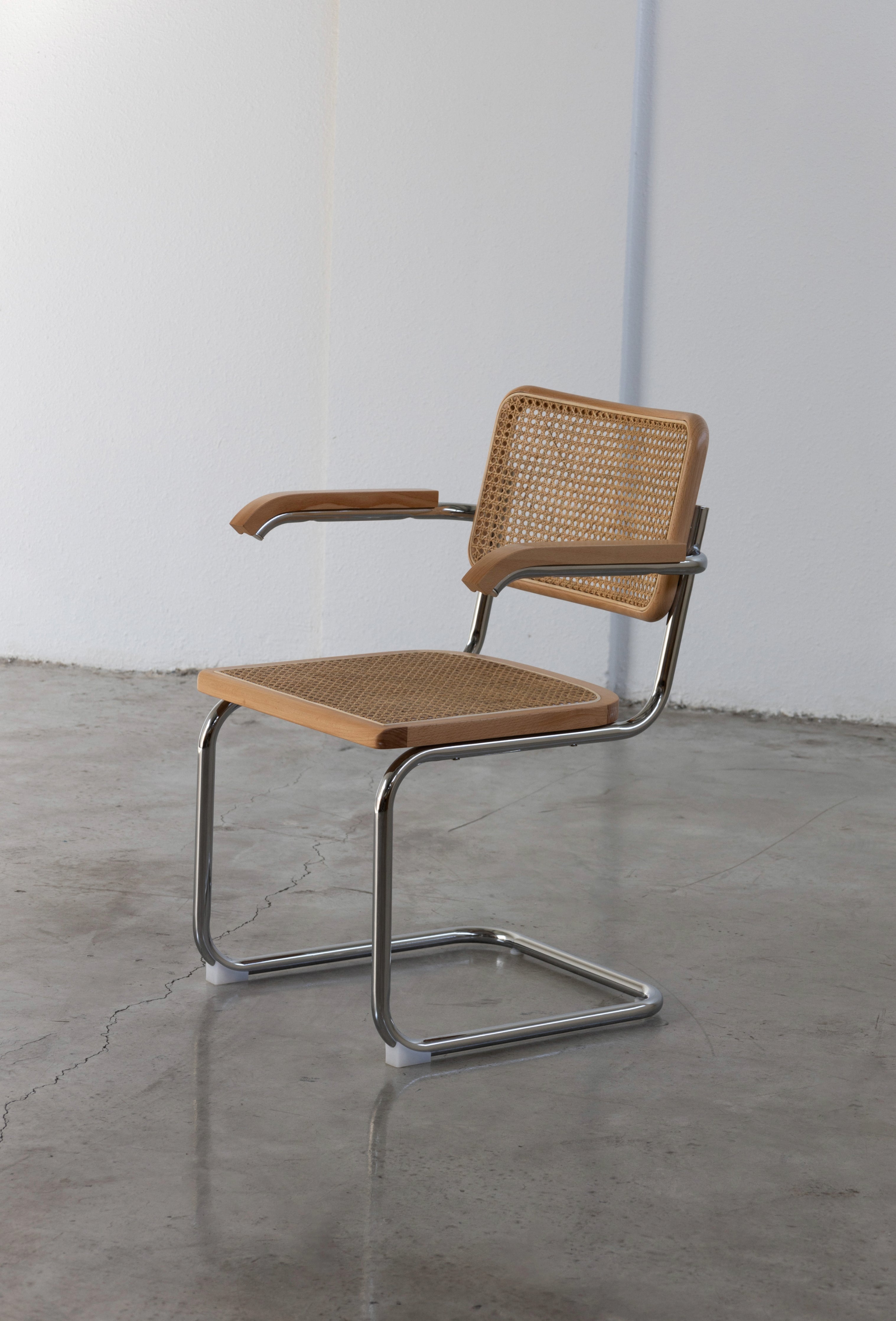 The Cantilever S 64 Rattan Modern Designer Chair UAE | Forma