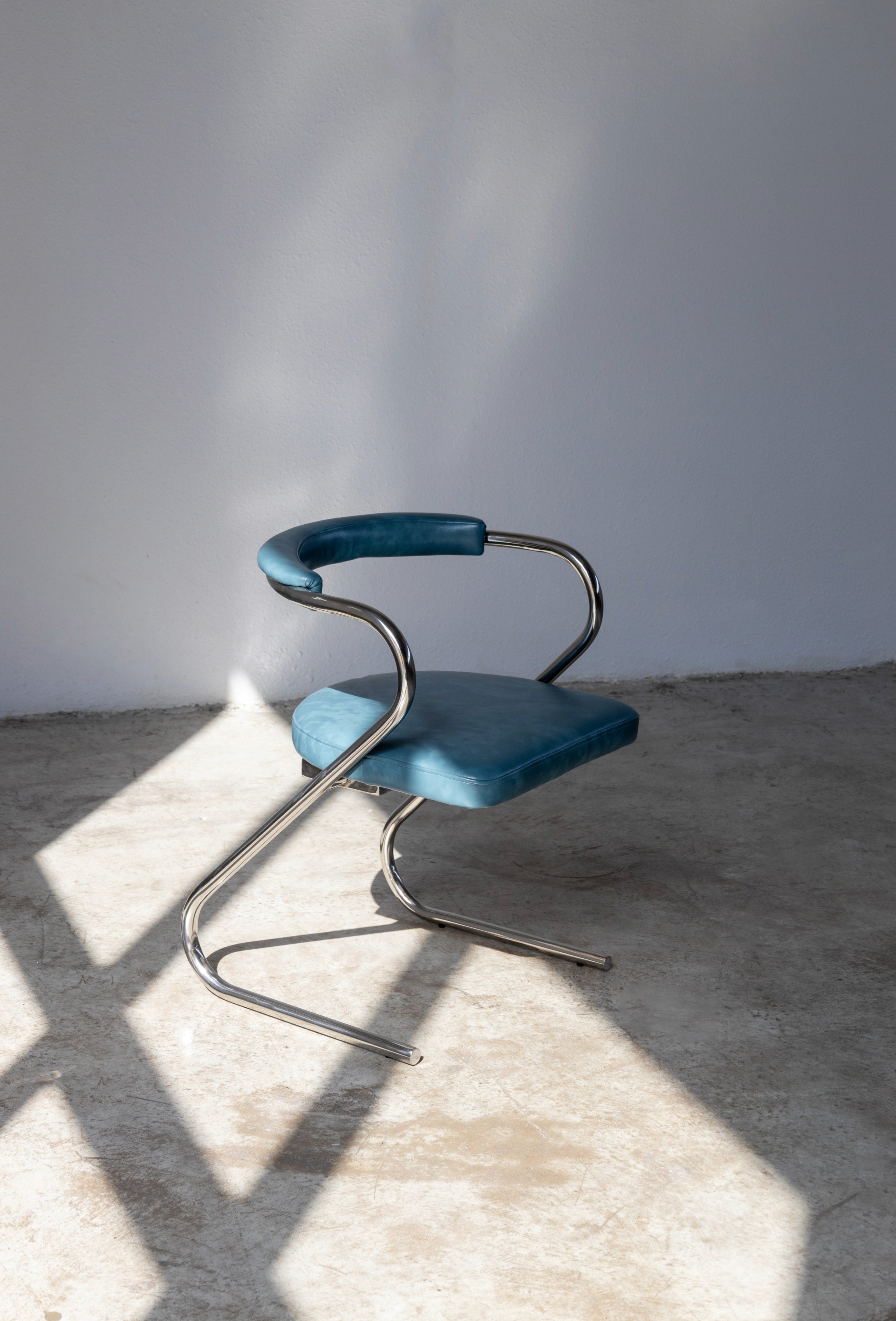 Chrome Z Modern Chrome Designer Chair UAE | Forma