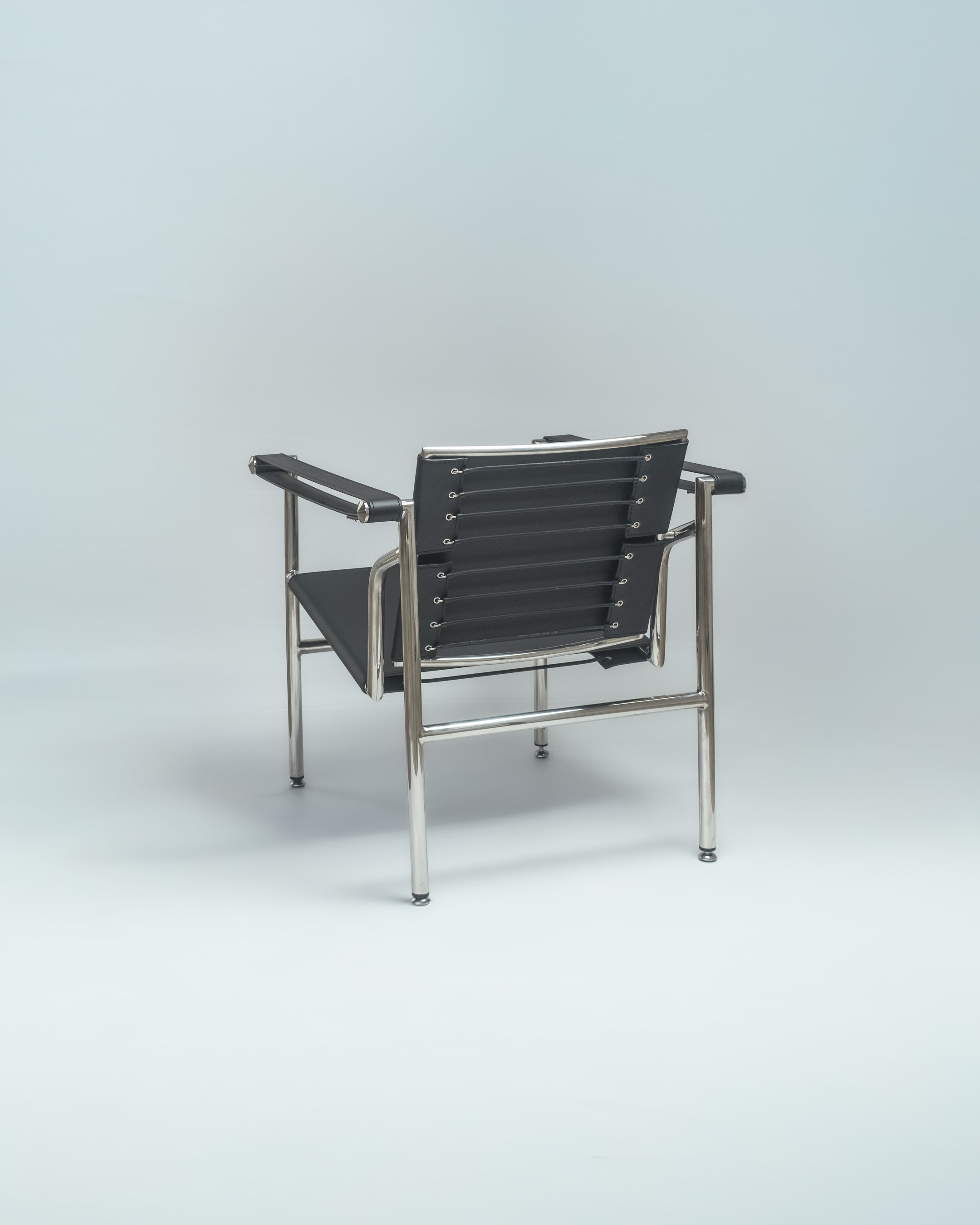 Explore the Basculant Chair by Le Corbusier, first exhibited in 1929. This stylish, vintage design combines timeless elegance with exceptional comfort.