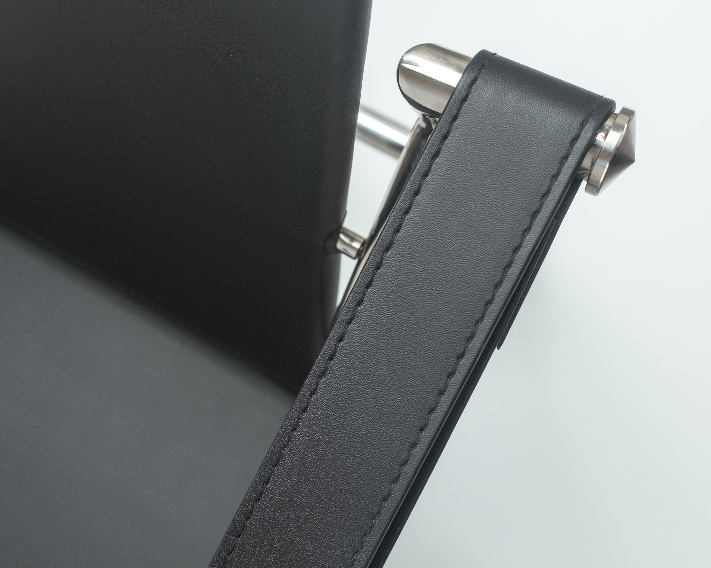 Explore the Basculant Chair by Le Corbusier, first exhibited in 1929. This stylish, vintage design combines timeless elegance with exceptional comfort.Explore the Basculant Chair by Le Corbusier, first exhibited in 1929. This stylish, vintage design combines timeless elegance with exceptional comfort.