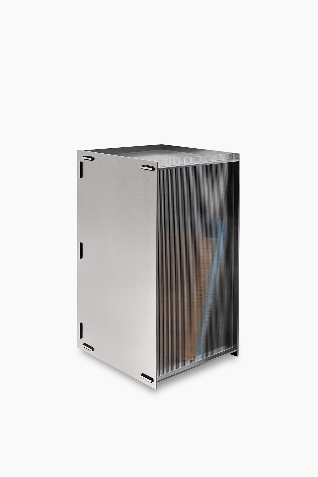 A silver side table with a clear, cylindrical container on top, set against a white background.