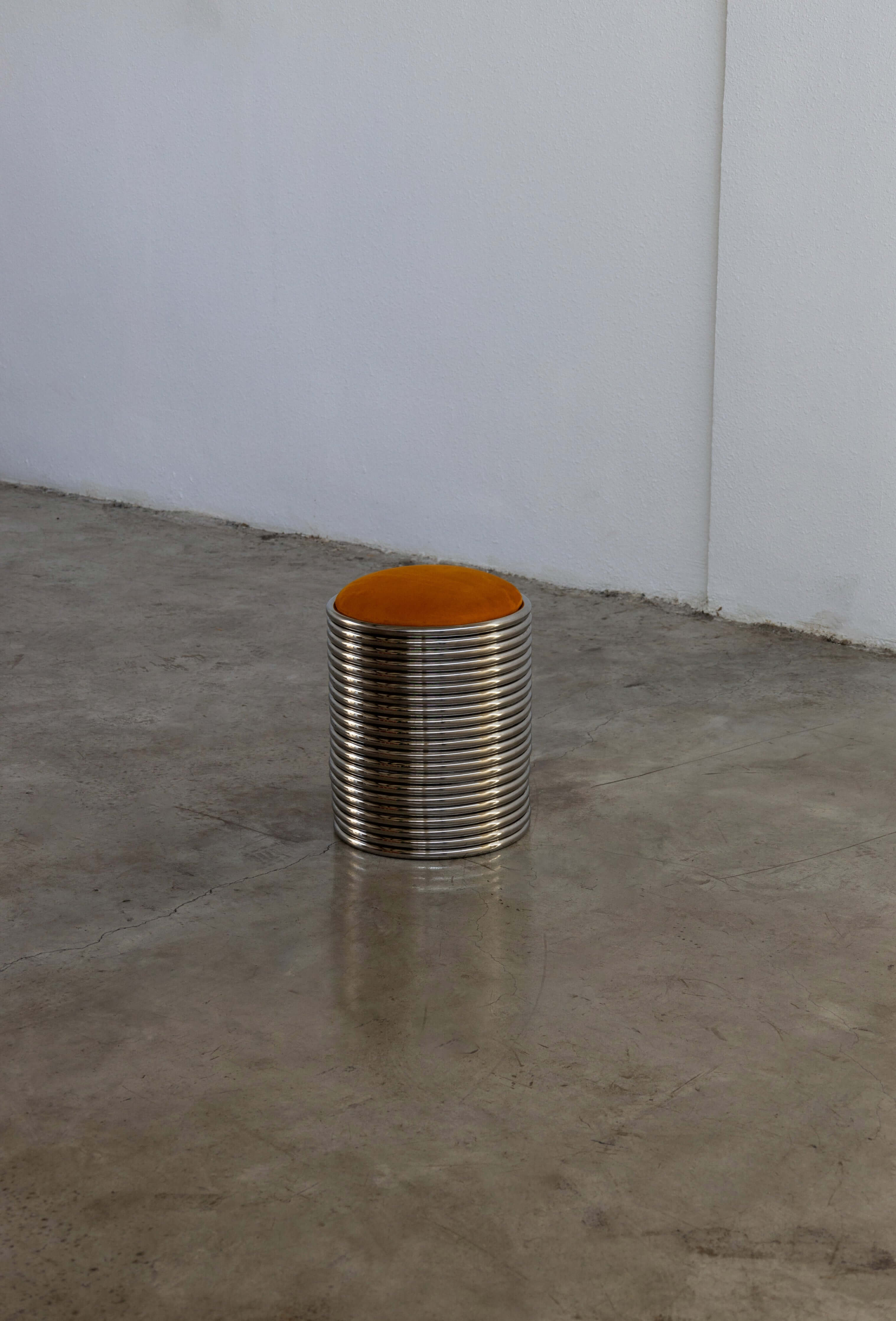 Modern orange Rings Stool – Durable stainless-steel stool with minimalist design, 40 cm high and 34 cm in diameter, suitable for contemporary decor.