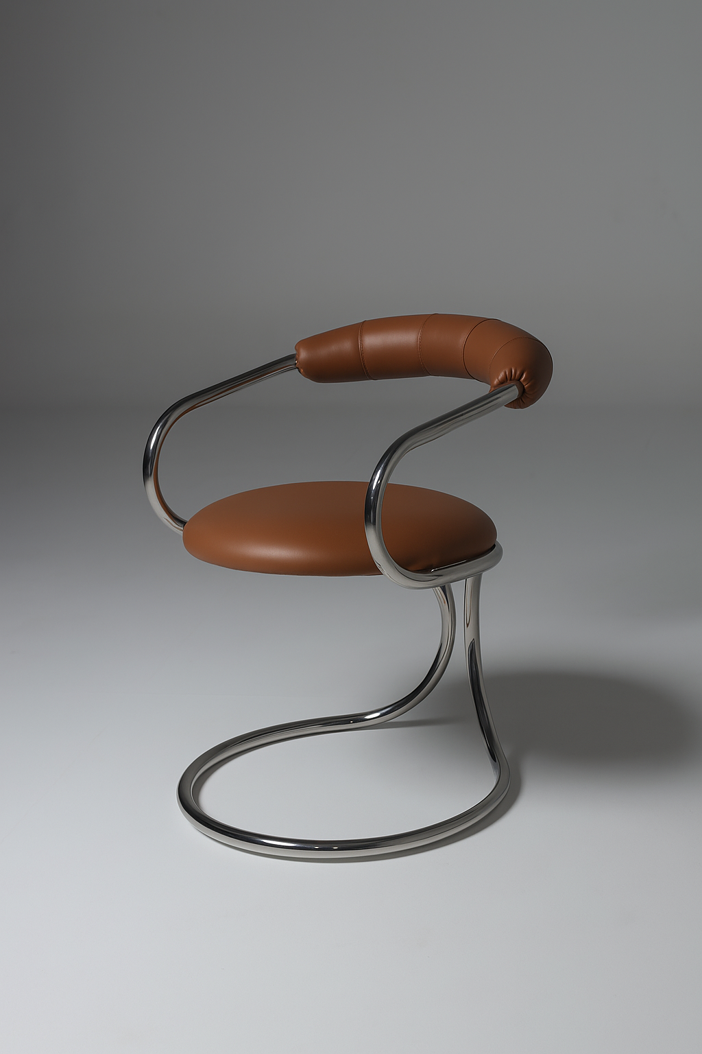 Brown chair with metal frame on a gray background